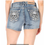 Shorts largos con diamantes de imitación de calavera feroz